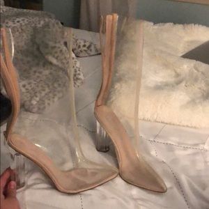 transparent heeled boots.